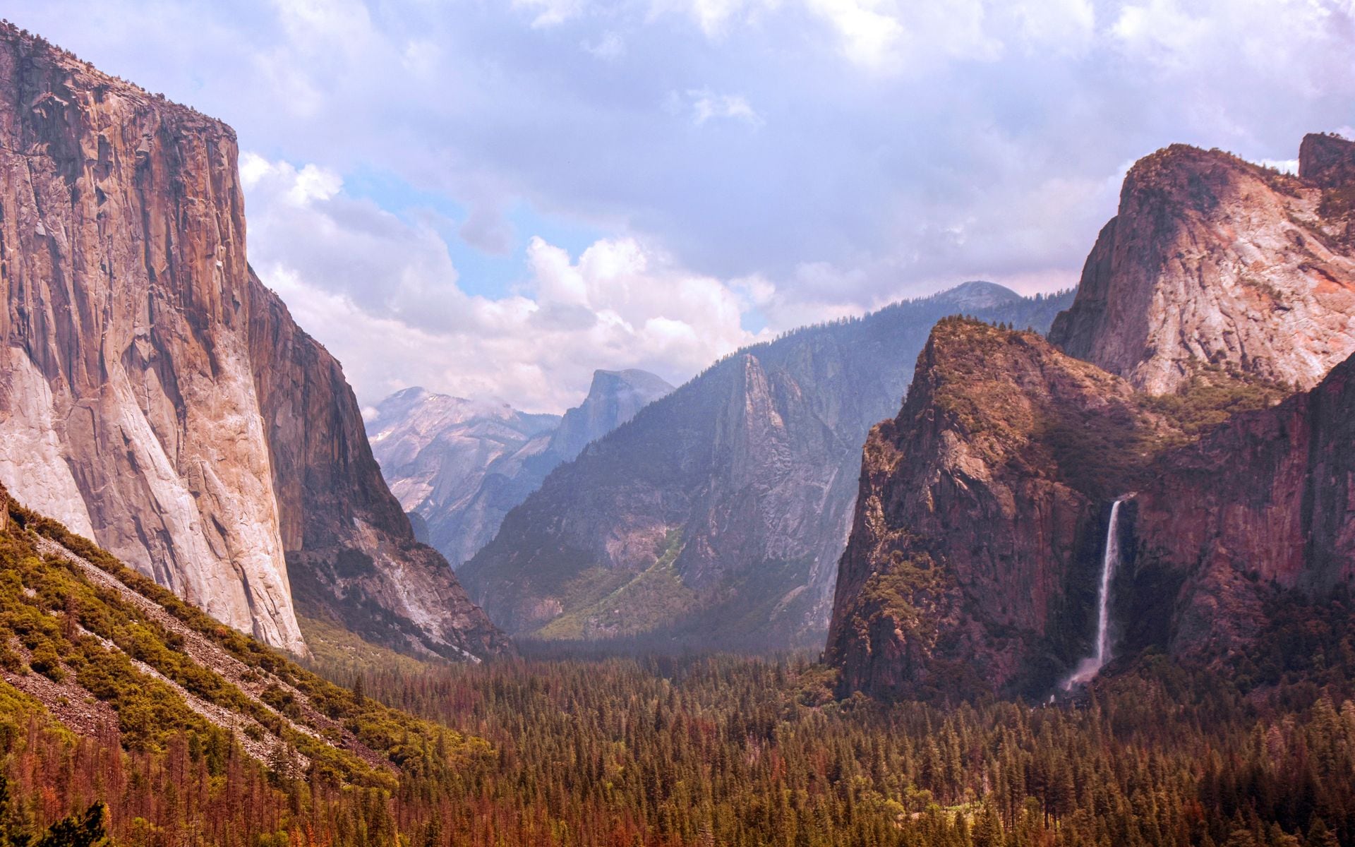 Tunnel View overlook in Yosemite with El Capitan, Bridalveil Fall, and Half Dome catching morning light